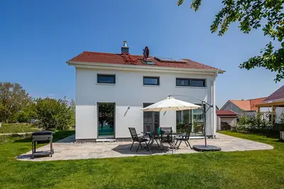 Image de Maison Rügen-Détendez-vous avec des équipements modernes de haute qualité à proximité Bodden