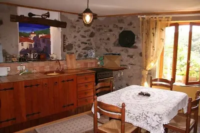 Image de Gîte pittoresque avec terrasses dans un village de montagne idyllique avec vue