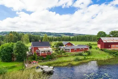 Image de Maison de rĂŞve avec sa propre plage au bord du lac
