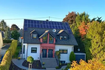 Image de Appartement (100m2) avec 2 chambres et un balcon privé