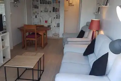 Grand 2 pièces, cadre verdoyant et calme à 2 pas de la plage et de la digue