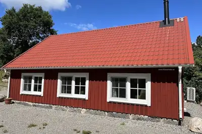 Image de Maison de vacances \"Gamla Smedja\", Klasamåla, Småland - ferme au bord du lac Åsnen. . .