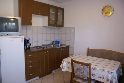 Image de Appartement au rez-de-chaussée pour 4-5 personnes avec Tv satellite
