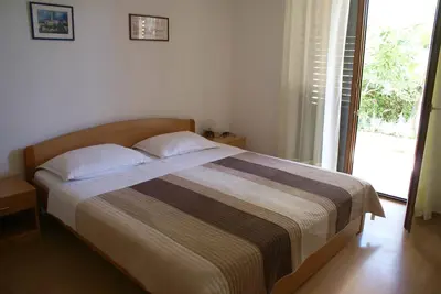 Image de Appartement au rez-de-chaussée pour 6-7 pers. - 3 chambres et 2 salles de bain