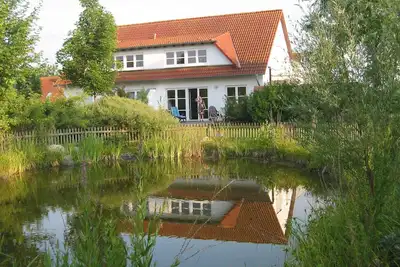 Image de Maison de vacances joliment meublée / Rügen / Garz / Zudar / Parc résidentiel Losentitz