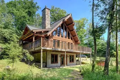 Image de Vacances de rĂŞve dans une cabane en rondins au bord du lac Mont Tremblant