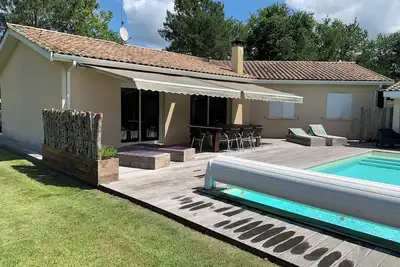 Image de Maison au calme piscine chauffée sécurisée à 10 minutes de la plage avec jardin