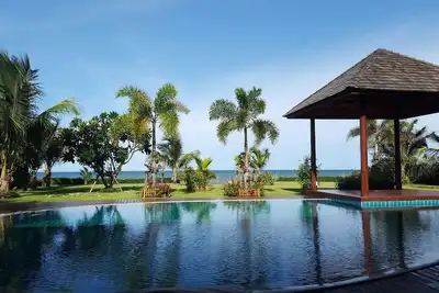Image de Une villade luxe sous les tropiques au bord de la plage dans un domaine privé