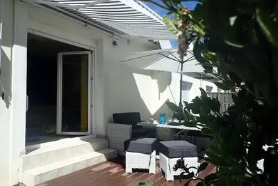 Image de Maison moderne, climatisée, à 5 minutes à pied de la plage, calme. 3 chambres.