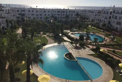 Image de Magnifique Duplexe Vue sur mer et piscines accès direct plage