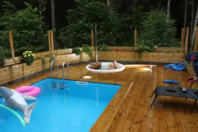 Image de Maison avec cadre verdoyant et piscine près de la ville de Stockholm