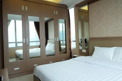 Image de 1br / 2 + 1br Denpasar Residence Appartement de luxe Ă Kuningan Ville Par Travelio