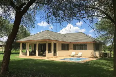 Image de Bungalow confortable sur le prestigieux domaine de golf et de la faune en Tanzanie