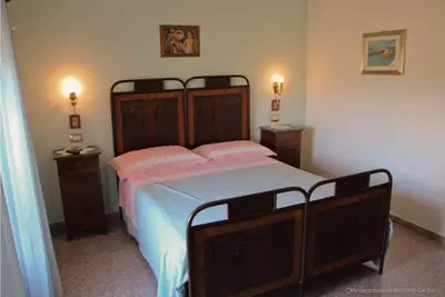 Image de Montefalco Guest House - Chambre rouge