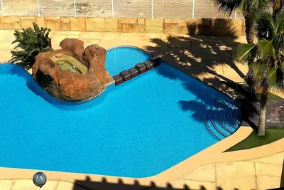 Image de Appartement avec piscine près du centre et de la plage