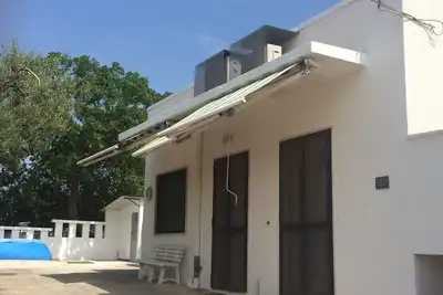 Image de trullo 2 chambres avec air conditionné, une vue fantastique, entouré par des oliveraies
