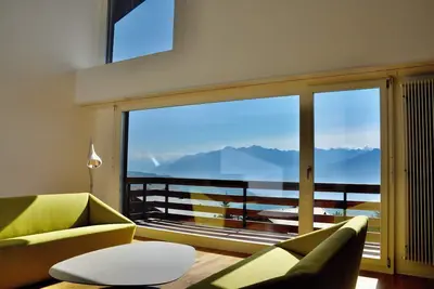 Image de Grand duplex contemporain (200 m2) au pied des pistes avec vue panoramique
