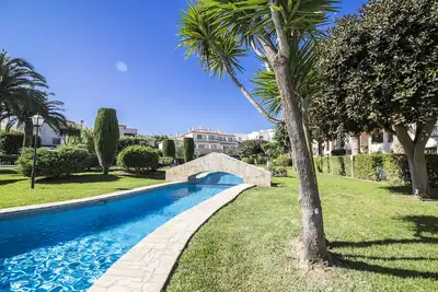 Image de Maison avec jardin, piscine et air conditionné, sur la plage de Arenal, à 400m.
