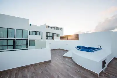 Image de Immense Ph central avec toit privé et jacuzzi