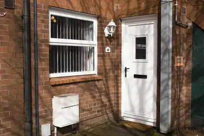 Image de Appartement de 2 chambres dans le centre-ville avec parking gratuit et Wifi gratuit