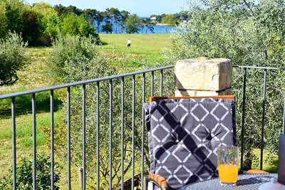 Image de Maison de vacances Umag Savudrija, près de la plage, balcon vue mer, WiFi