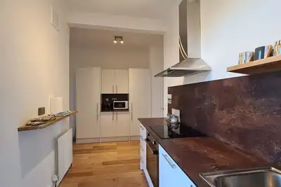 Image de Appartement confortable de trois chambres à Londres