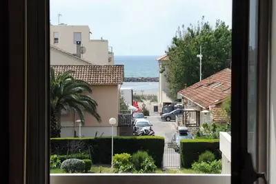 Image de Appartement climatisé, garage, grande terrasse vue mer/jardin, plage à 50m