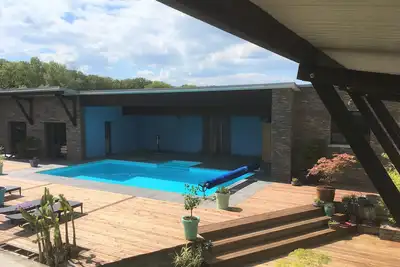 Image de GÎTES 23m2 avec terrasse, piscine chauffée, Spa et sauna