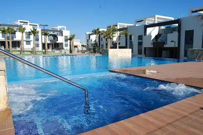 Image de Oasis Beach Vii Belle du Sud face à la maison de vacances pour 5 personnes.