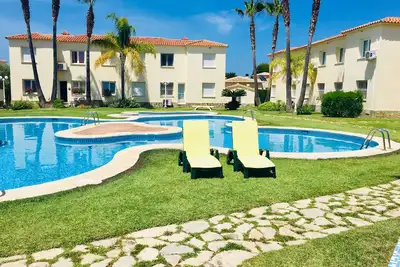 Image de Appartement au bord de la piscine, à quelques minutes de la magnifique plage et du parcours de golf 18 trous
