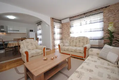 Image de Appartement neuf lumineux et spacieux pour 8 à proximité de la plage