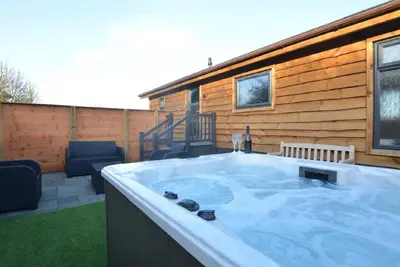 Image de Badgers Den- Un lodge de luxe, 2 chambres en suite avec bain à remous privé