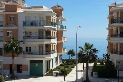 Image de Appartement Beach, vue sur la mer et piscine sur le toit. Unltd canaux WiFi et tv satellite gratuites