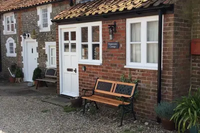 Image de Un traditionnel en briques et silex North Norfolk Cottage