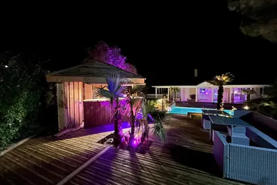 Image de Beach house luxueuse, 4 chambres, piscine chauffée, jaccuzi, entre lac et océan