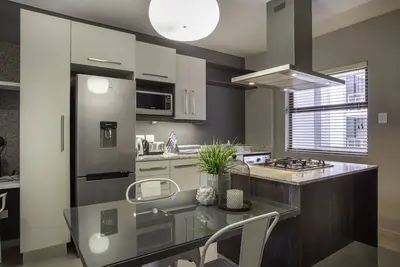 Image de C. A. G un appartement d'une chambre à Sandton Johannesburg