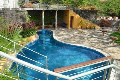 Image de Studio flambant neuf / appartement avec vue sur la piscine / l'océan