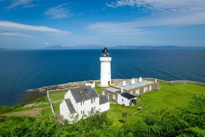 Image de The Lighthouse Cottage - maison spacieuse et unique avec une vue imprenable sur la mer
