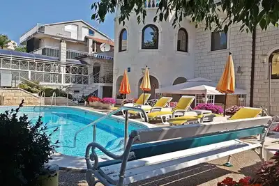 Image de Appartement 2 avec piscine, wifi, satv, parking privé et bateau gratuit