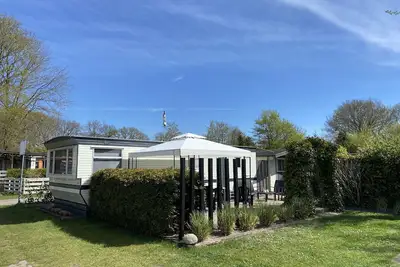 Image de Chalet dans la zone boisée incl. Vélo et piscine