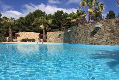 Image de Appartement au premier étage dans résidence avec piscine