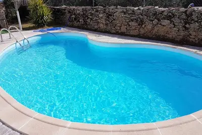 Image de Homerez - Maison spacieuse avec jardin à proximité de Bemposta + piscine privée