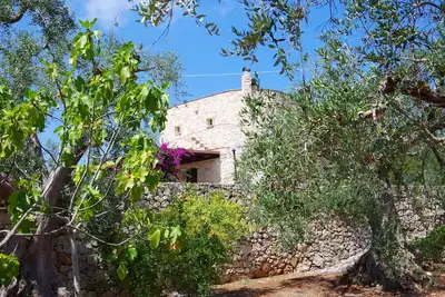 Image de Une maison de vacances pittoresque et centenaire dans les vertes collines de Ostuni