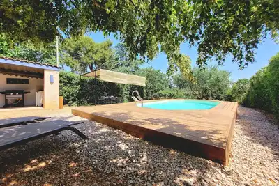 Image de Maison en pierres classée 3* piscine privée et climatisation dans hameau calme