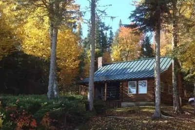 Image de Cozy & Charming Lakefront Log Cabin sur le lac Cupsuptic (Rangeley, Me)