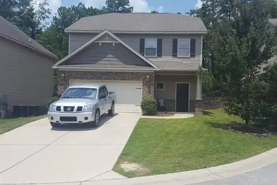 Image de Maison avec 3 chambres et une belle terrasse arrière.