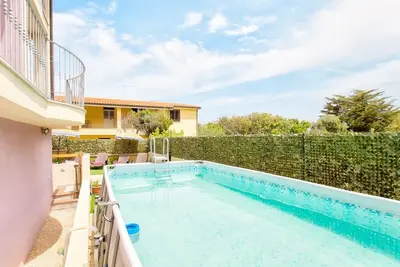 Image de Grande villa à Valledoria avec piscine pour 10 personnes à 500 mètres de la plage