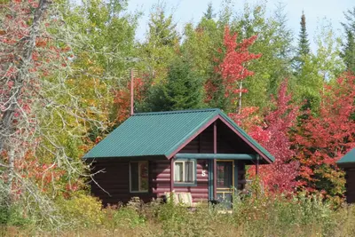 Image de Cabine Cozy Avec Vue Pond