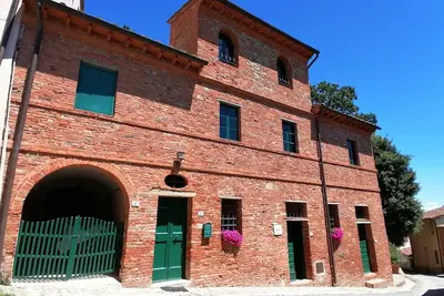 Image de Top-Hill Farm-House dans un village toscan pittoresque avec une vue imprenable.