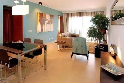 Image de Appartement de deux chambres au rez-de-chaussée avec piscine privée et vue mer